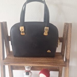 Chic Black Leather Satchel with Gold Accents
